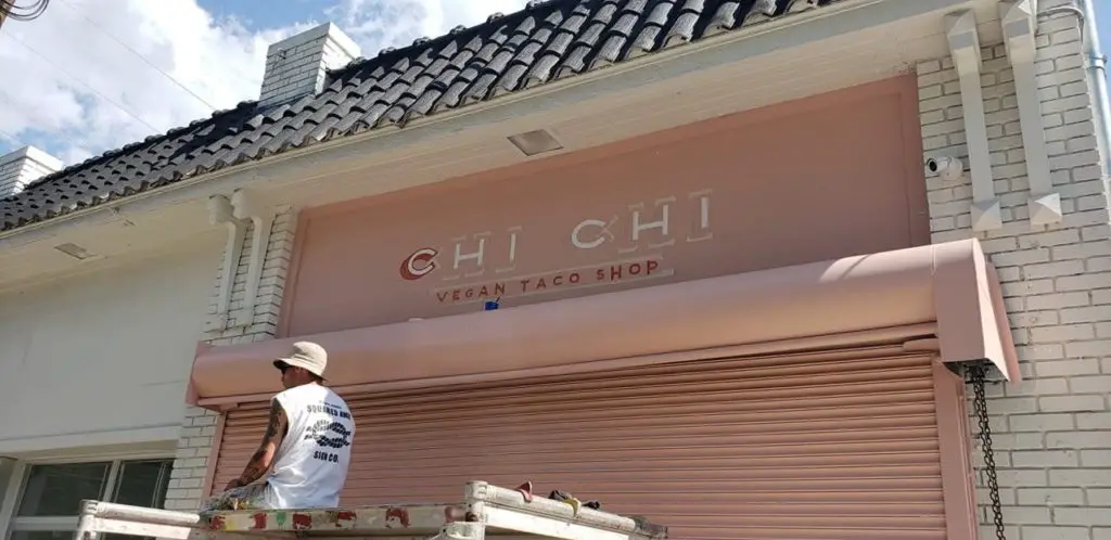 Chi Chi Vegan Taco Shop's pastel pink storefront.