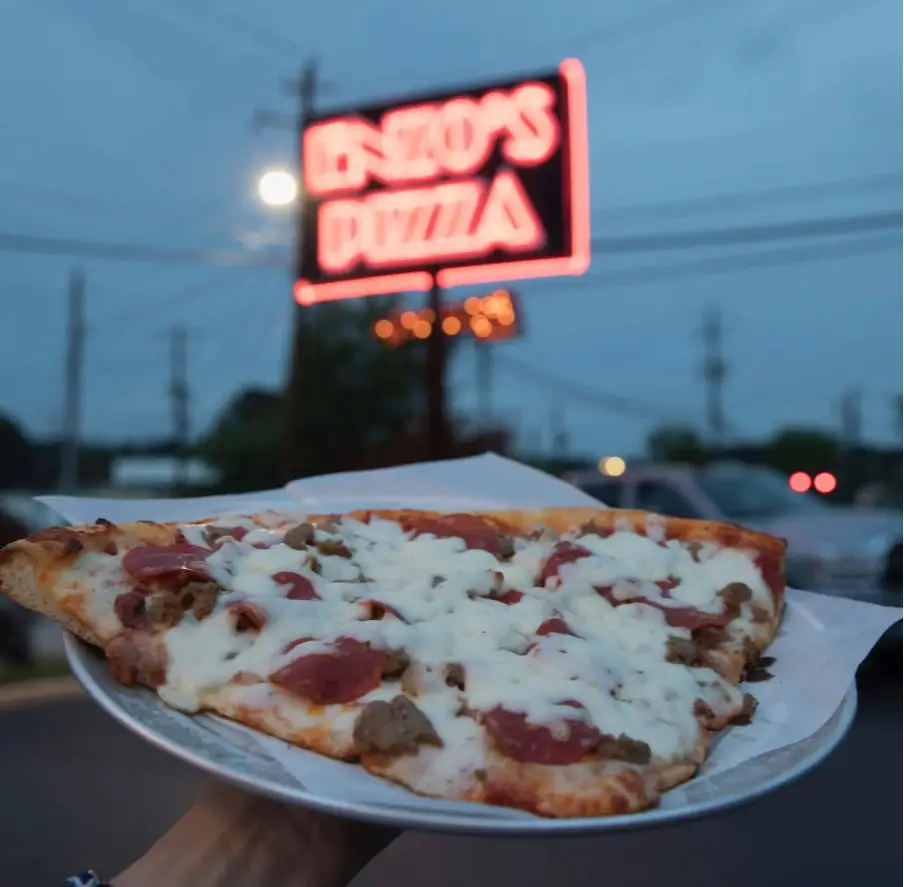 The family-owned Italian pizzeria serves pizza as a pie or by the slice and sells other food options such as pastas, salads, sandwiches, and wings.